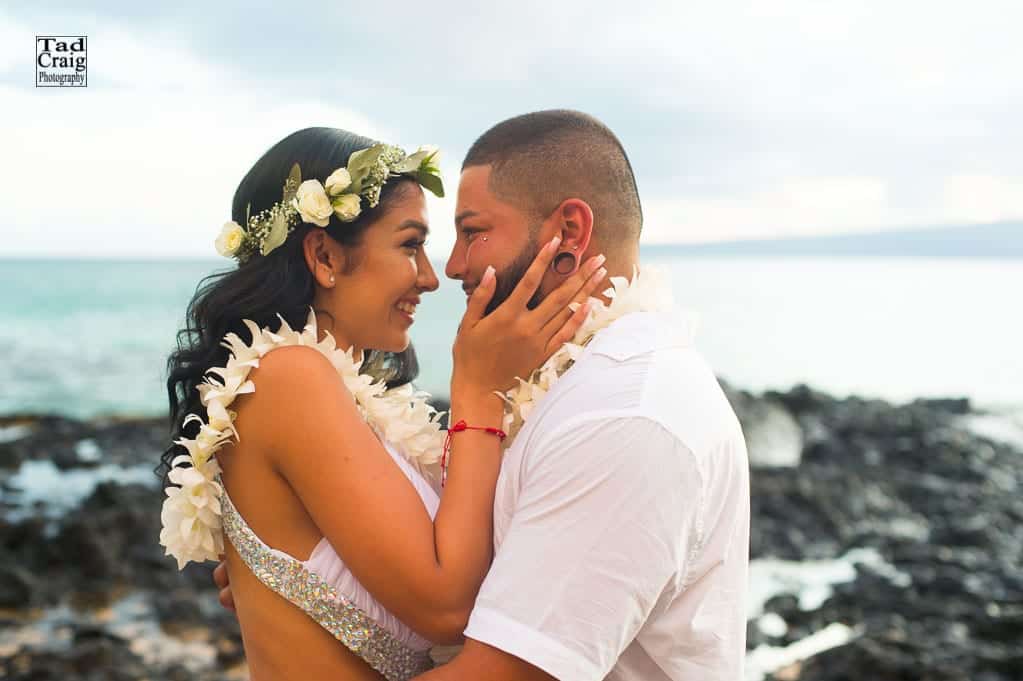 Happy couple celebrating their marriage on a Maui Hawaii Beach