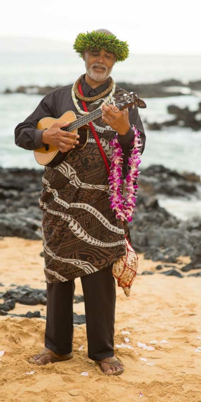 Ernest Puau playing ukulele at a wedding