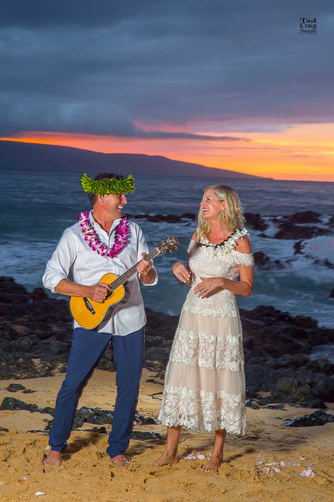 Happy Couple getting silly after saying their vows on a beach in Maui