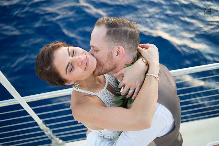 Just Married Neck Kisses on Trilogy Catamaran 