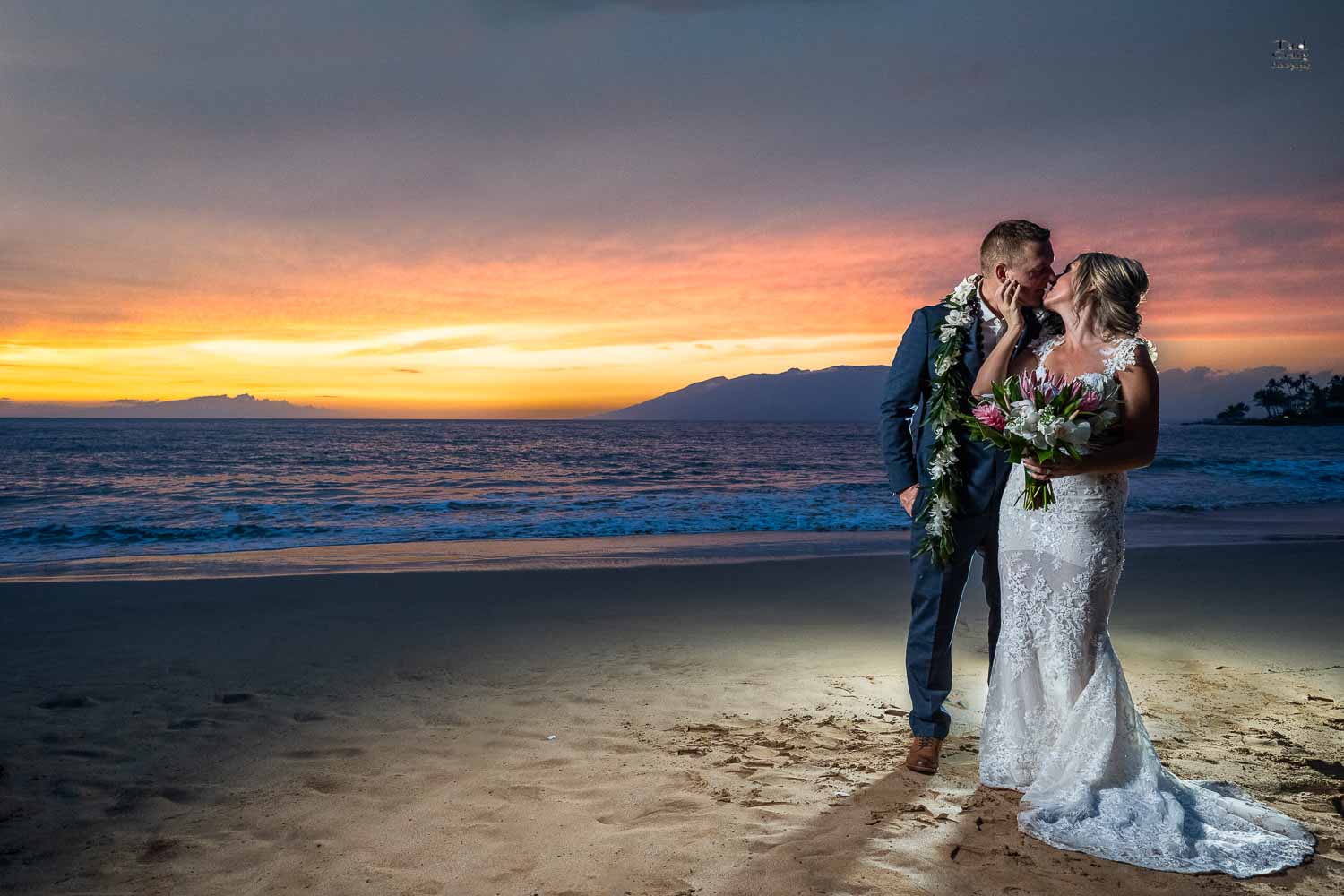 Four Seasons Wedding with a stunning sunset on wailea beach