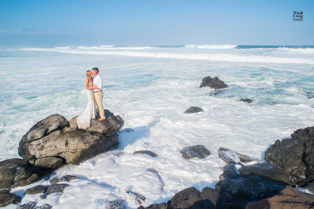 Adventurous Couple Kissing with ocean all around them, Maui Hawaii Wedding