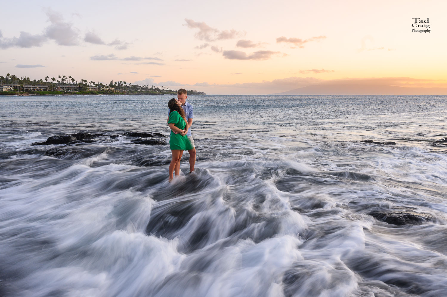 Maui Engagement Photographer at sunset on the rocks at Merrimans